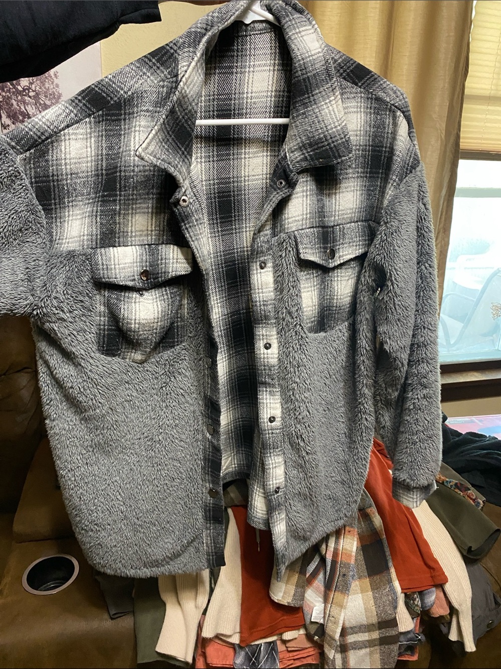 Woman’s large flannel sweater